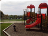 Todder Playing on Miller Field Playground Equipment
